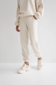 Spodnie dresowe typu jogger w kolorze BRIGHT BEIGE ze strukturalnej dzianiny - DISPLAY